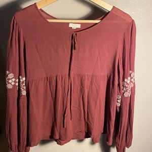 red/pink long sleeve blouse